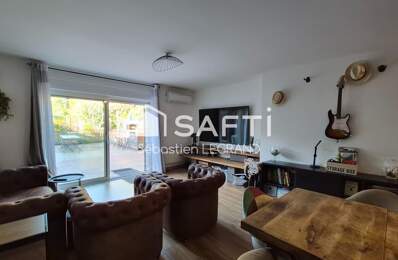 Appartement 3 chambres avec jardin, cave et parkings — photo du bien