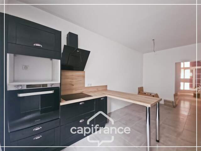 Immeuble en pierre à fort potentiel au centre de Puymirol — photo du bien