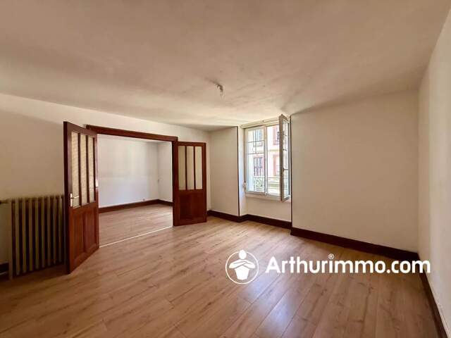 Appartement type T3 en rdc surélevé avec cave et garage — photo du bien