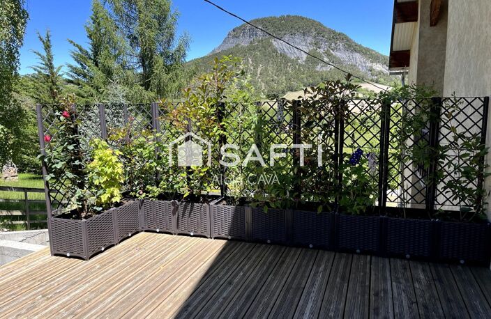 Appartement de 121m² avec mezzanine terrasse et parking dans une maison divisée en 2 logments — photo 3