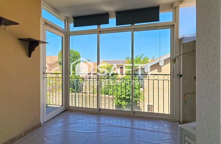 Appartement de 60 m² avec terrasse, deux places de parking couverte et cellier. — photo 3