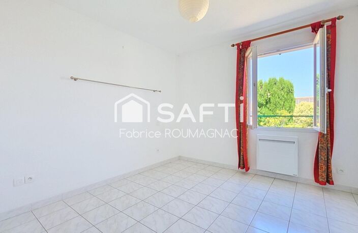 Appartement de 60 m² avec terrasse, deux places de parking couverte et cellier. — photo 5