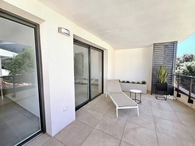 A VENDRE - Appartement 2 pièces 44 M2- Terrasse- 2 Places de — photo du bien