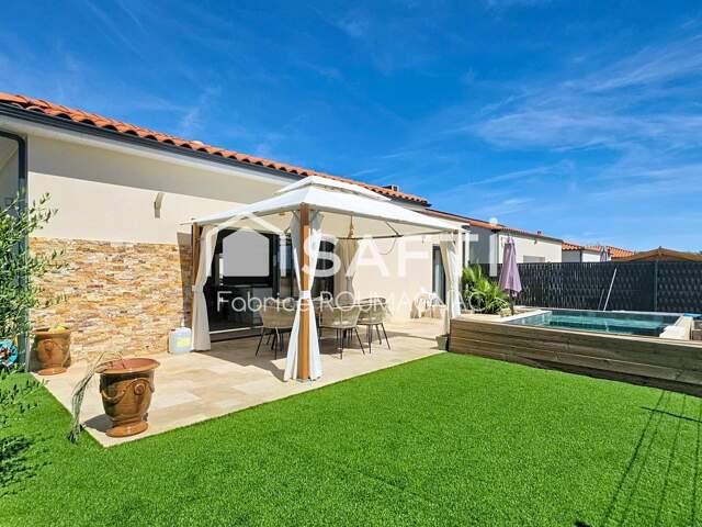 Villa de plain-pied de 119 m² avec quatre chambres piscine et garage — photo du bien