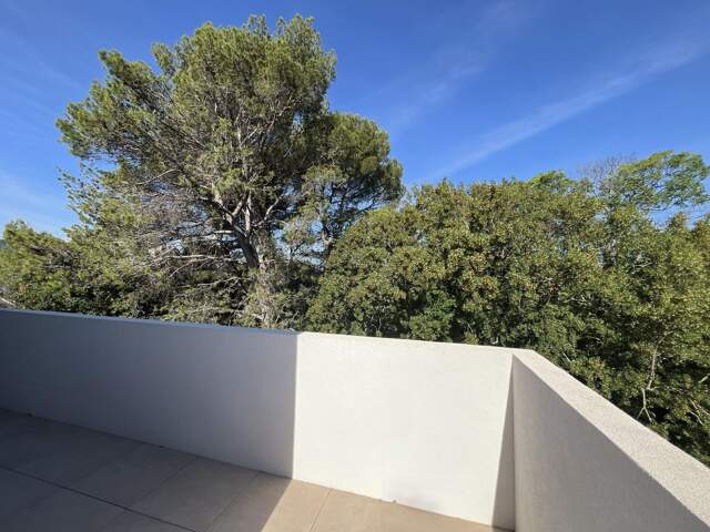 T3 neuf, dernier étage avec terrasse d'angle et vue dégagée — photo du bien
