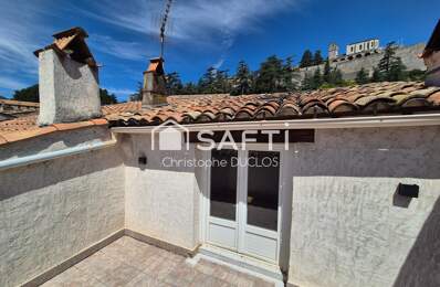 Appartement en duplex avec terrasse et garage non attenant. — photo du bien