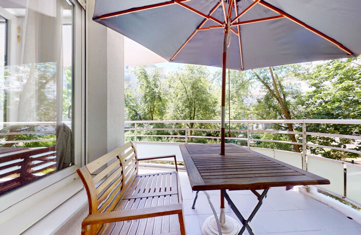 COEUR MONPLAISIR - T5 dans une résidence arborée avec terrasse, cave et garage double — photo 2