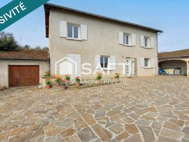 Située sur la commune de Saint-Martin-la-Plaine, je vous propose cette charmante Propriété Familiale de 146 m2 (+cellier de 24 m2 et garage de 26 m2), implantée sur 3300 m2 de terrain avec un petit étang. — photo du bien
