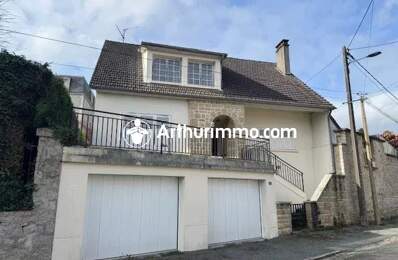 Maison de 116m² avec sous sol et garages — photo du bien
