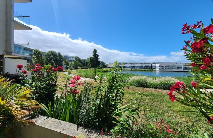 LA ROCHELLE – LES MINIMES – APPARTEMENT T2 AVEC TERRASSE 48m² PLEIN SUD VUE LAC ET PARKING SÉCURISÉ — photo 2
