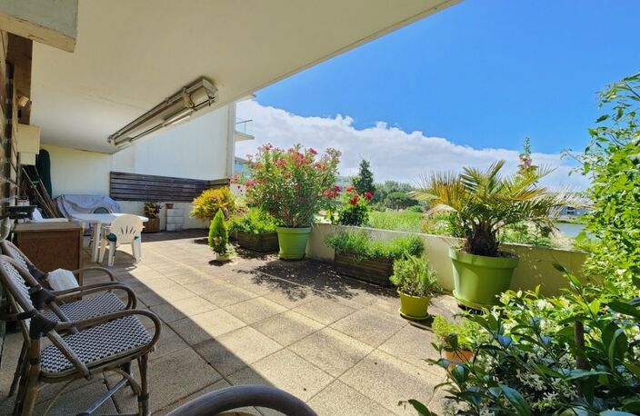 LA ROCHELLE – LES MINIMES – APPARTEMENT T2 AVEC TERRASSE 48m² PLEIN SUD VUE LAC ET PARKING SÉCURISÉ — photo 4