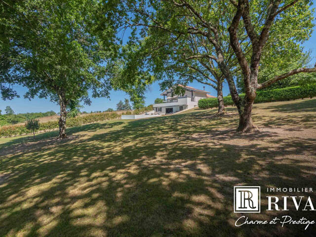 MAISON MODERNE DE 175M2 - 6400M2 DE PARC - GARAGE DE 228M2 — photo du bien