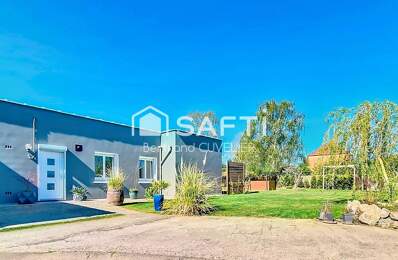 Maison plain pied rénovée avec nombreuses dépendances, garages et stationnements — photo du bien