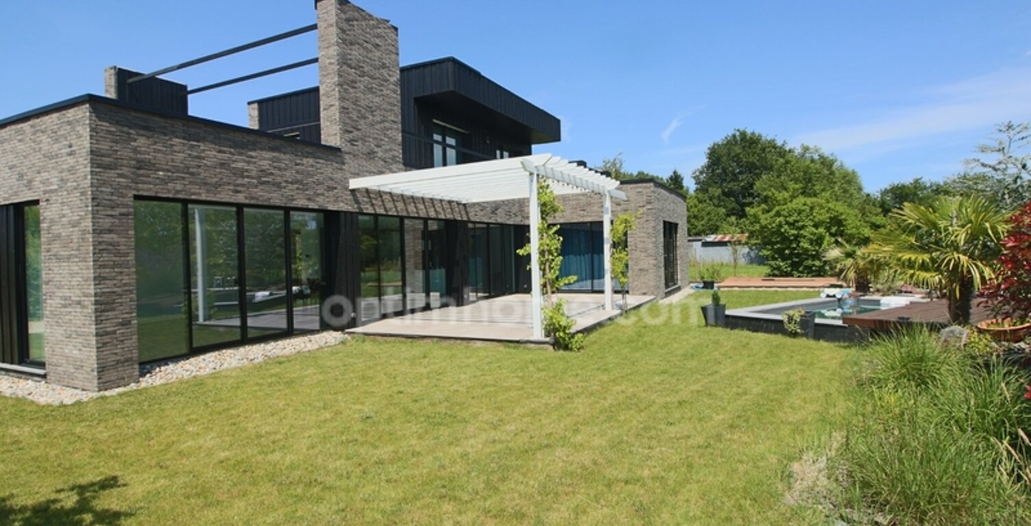 Templeuve-en-Pévèle – Maison cubique récente de 175 m² – Semi plain pied – Prestations haut de gamme — photo 1