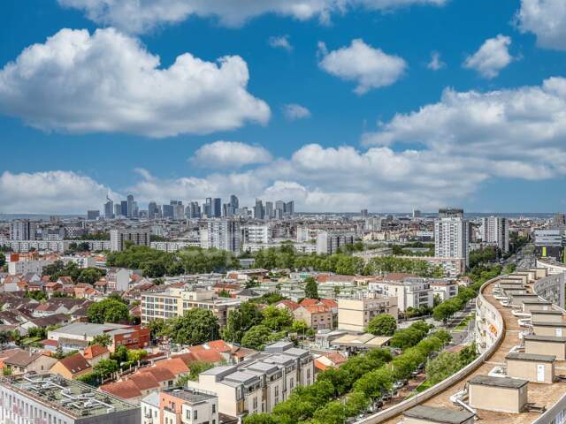 GENNEVILLIERS – AUX PORTES DU VILLAGE – 114 m² – 17e ET DERNIER ÉTAGE – VUE LA DÉFENSE — photo du bien