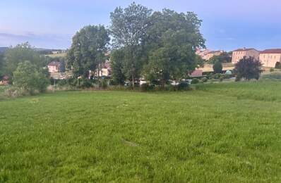 TERRAIN CONSTRUCTIBLE AU CŒUR DU VILLAGE — photo du bien