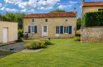 Maison en pierre avec jardin et garage — photo du bien