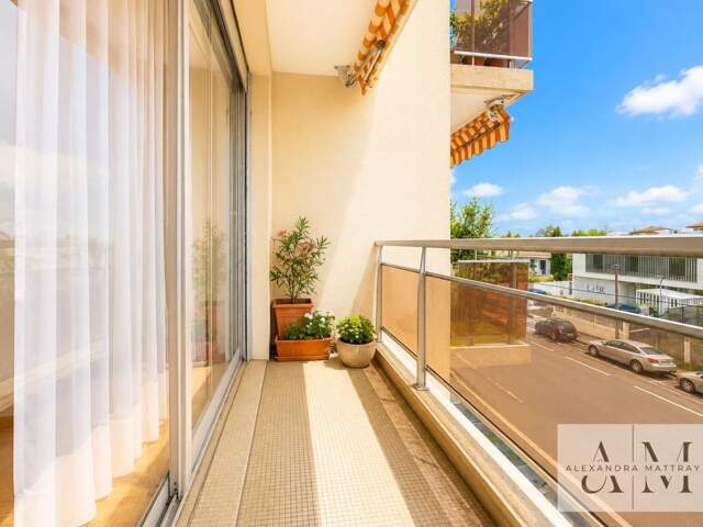 APPARTEMENT T5 avec cave et box — photo du bien
