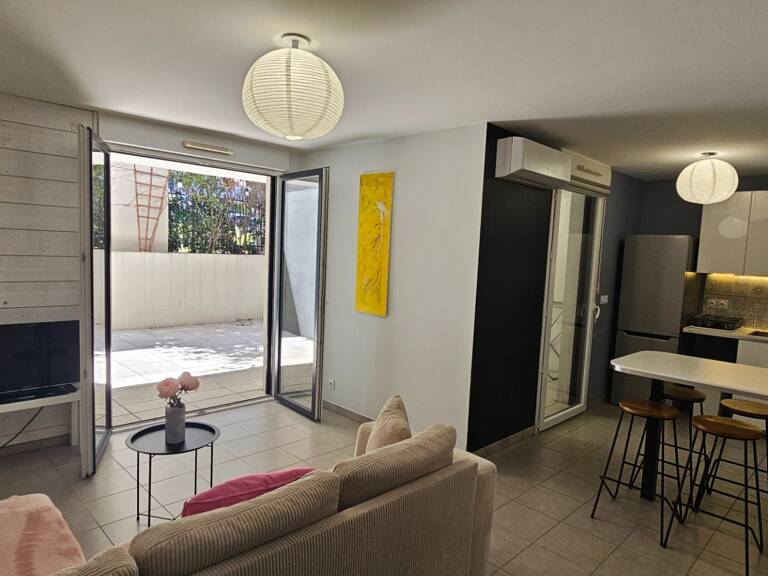 SAINT JEAN DE VEDAS (34) F3 avec grande terrasse et parking en sous-sol — photo 1