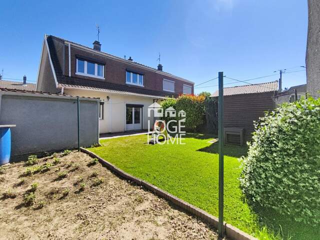 Maison 3 chambres, jardin et garage en secteur prisé et résidentiel — photo du bien