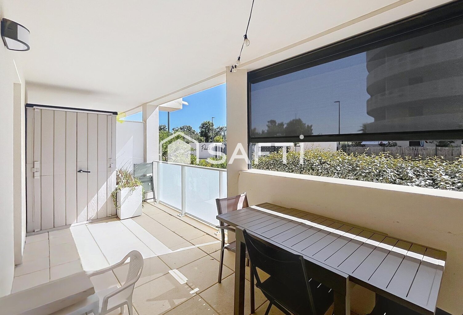 Appartement en rez-de-jardin avec terrasse — photo 1