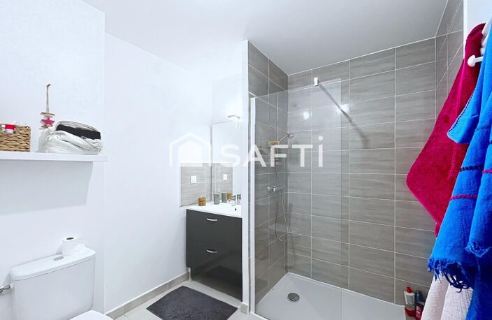 Appartement en rez-de-jardin avec terrasse — photo 5