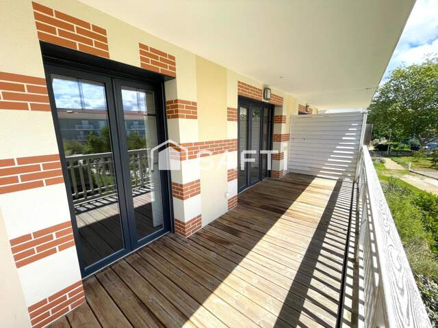 Appartement T2, balcon et place de parking couvert — photo du bien