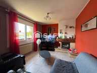 Maison de plain-pied avec grand terrain, garage et beau potentiel d'aménagement — photo 4