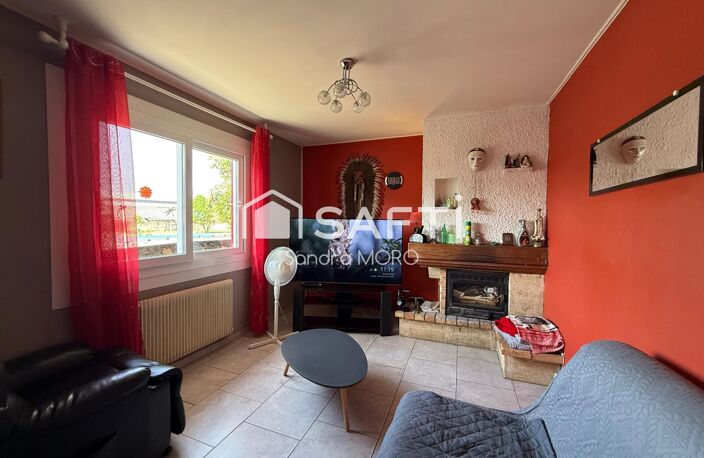 Maison de plain-pied avec grand terrain, garage et beau potentiel d'aménagement — photo 4
