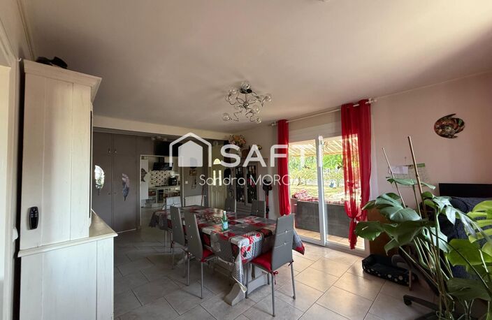 Maison de plain-pied avec grand terrain, garage et beau potentiel d'aménagement — photo 5