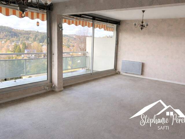 Appartement T3 de 88 m² avec balcon, garage et cave  Ussel — photo du bien