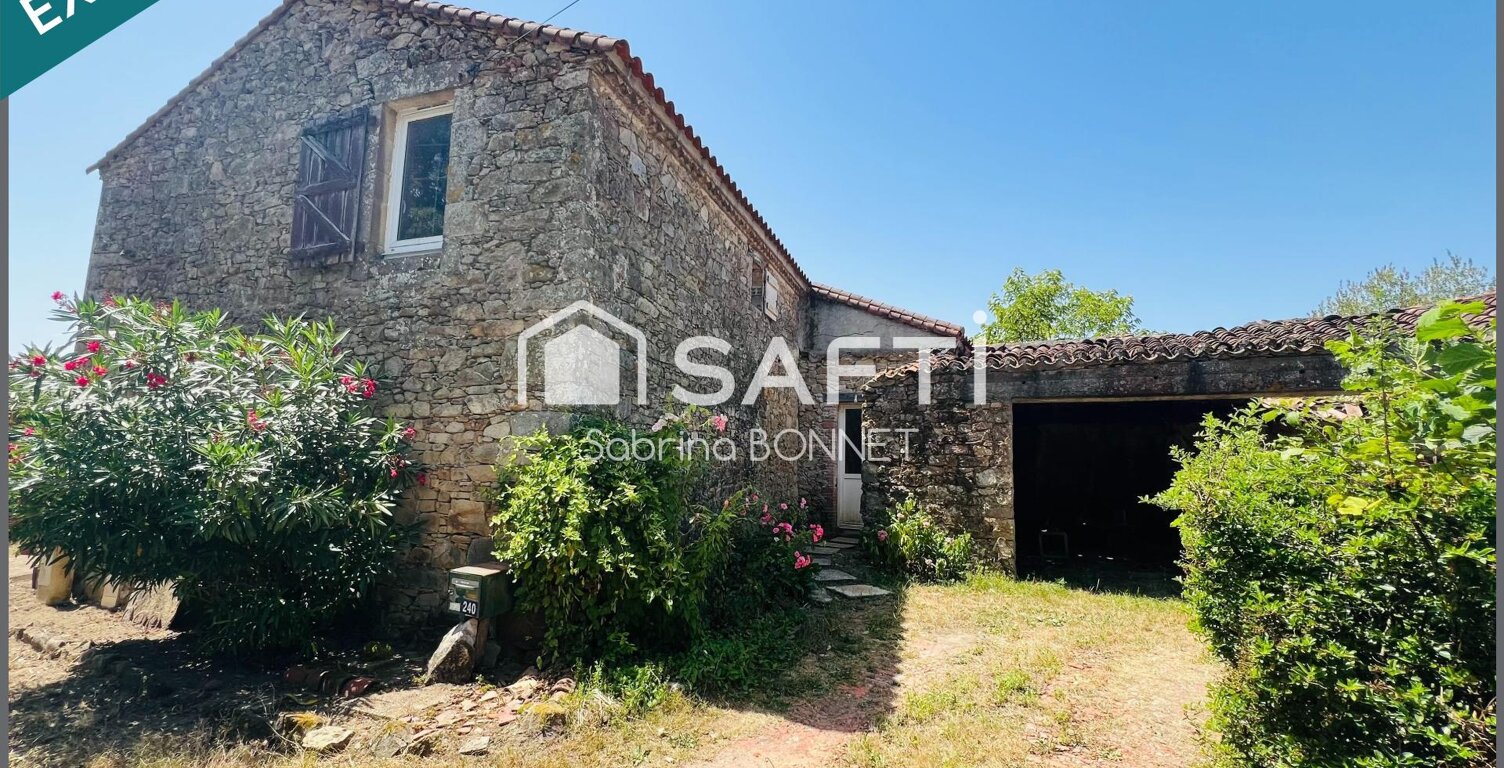 Maison en pierre de 105m² d'habitation, un grenier de 90 m² et 3 petites dépendances. — photo 1