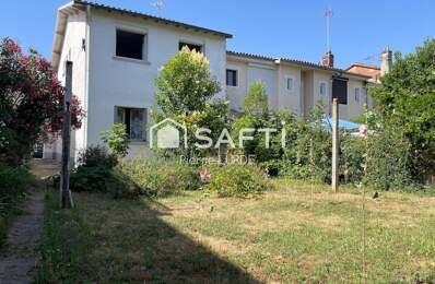 Maison de ville de 92 m2 avec garage et jardin — photo du bien
