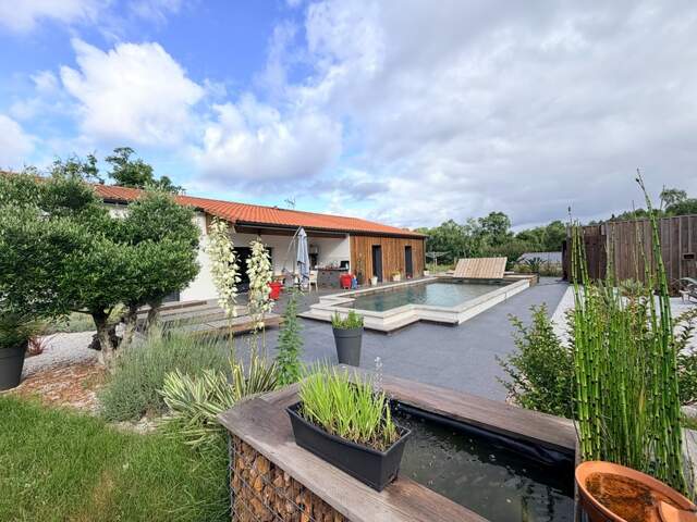 Maison contemporaine (DPE A) avec piscine et SPA à ESCOURCE à 15 minutes de l'Ocean et 10 minutes de MIMIZAN — photo du bien