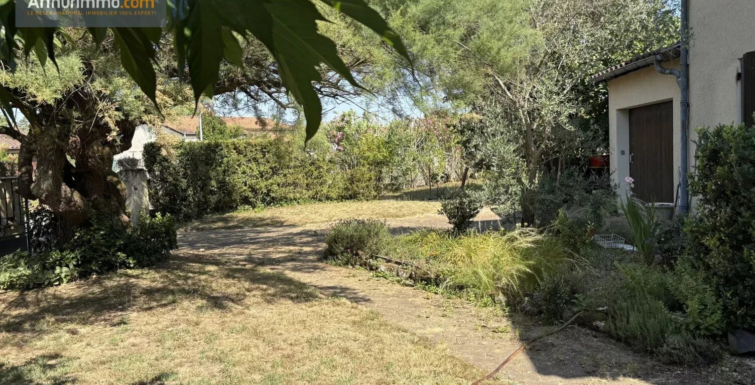 maison de plain pied avec jardin et garage — photo 1
