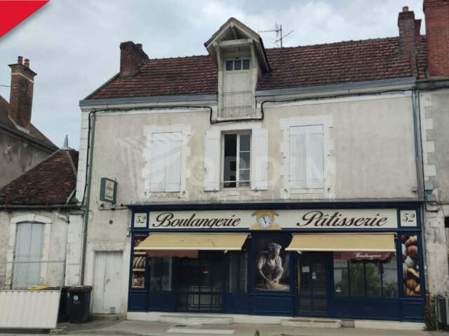 Immeuble de rapport avec local et appartement — photo du bien