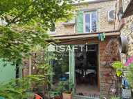 MAISON DE VILLE  AVEC JARDIN — photo 2