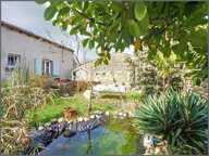 MAGNIFIQUE MAISON EN PIERRE AVEC JARDIN ET DEPENDANCES — photo 2