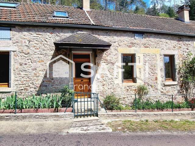 Maison en pierre de 157m2 avec jardin atypique — photo du bien