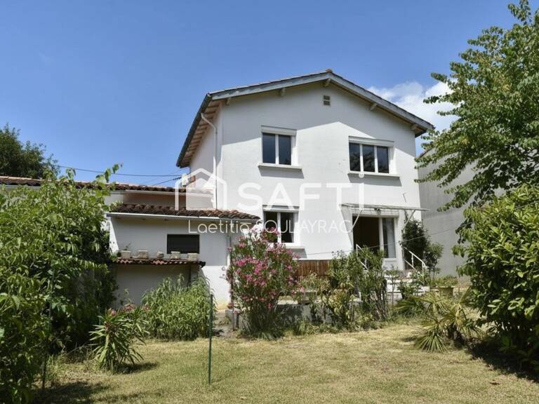 A proximité du centre, charmante maison avec garage et jardin. — photo 1