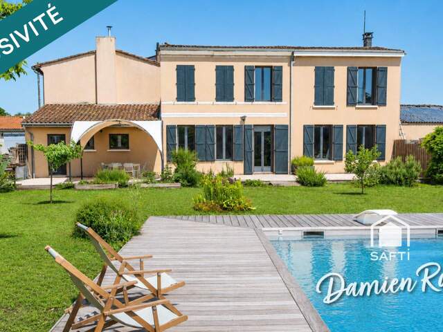 Maison en pierre de 200m² avec piscine et dépendance — photo du bien