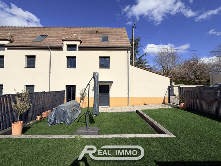 MAISON RÉCENTE AVEC JARDIN — photo 1
