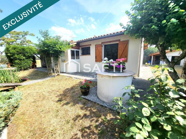 Maison plain-pied au calme avec grand jardin et beau potentiel — photo 1