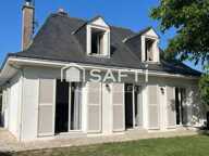 Maison familiale de 116 m² avec 4 chambres, sous-sol complet, terrain arboré de 1 077 m² et équipements énergétiques performants — photo 2
