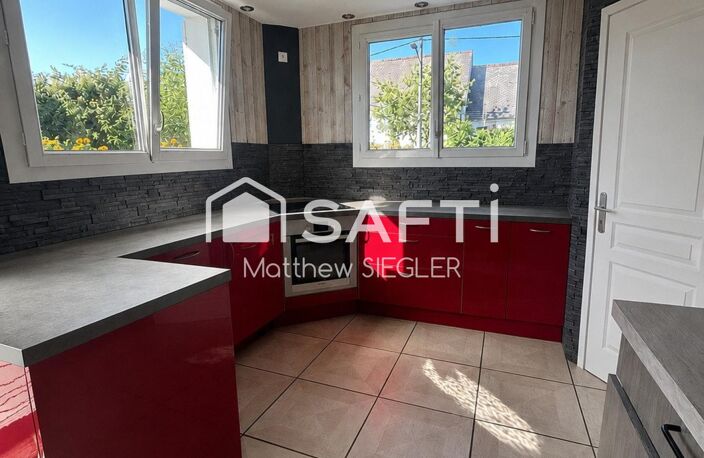 Maison familiale de 116 m² avec 4 chambres, sous-sol complet, terrain arboré de 1 077 m² et équipements énergétiques performants — photo 3