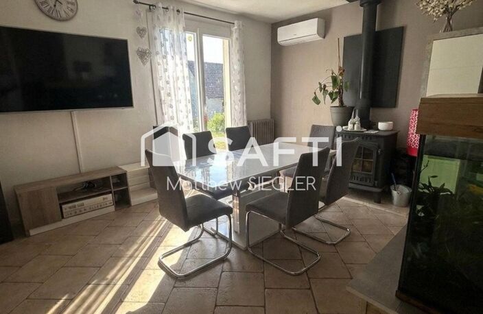 Maison familiale de 116 m² avec 4 chambres, sous-sol complet, terrain arboré de 1 077 m² et équipements énergétiques performants — photo 4
