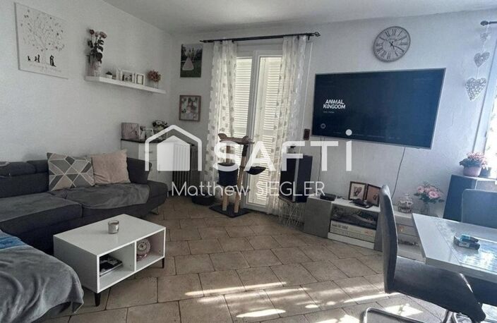 Maison familiale de 116 m² avec 4 chambres, sous-sol complet, terrain arboré de 1 077 m² et équipements énergétiques performants — photo 5
