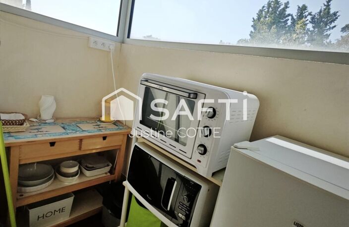 T2 rénové : balcon, ascenseur, stationnement libre — photo 3