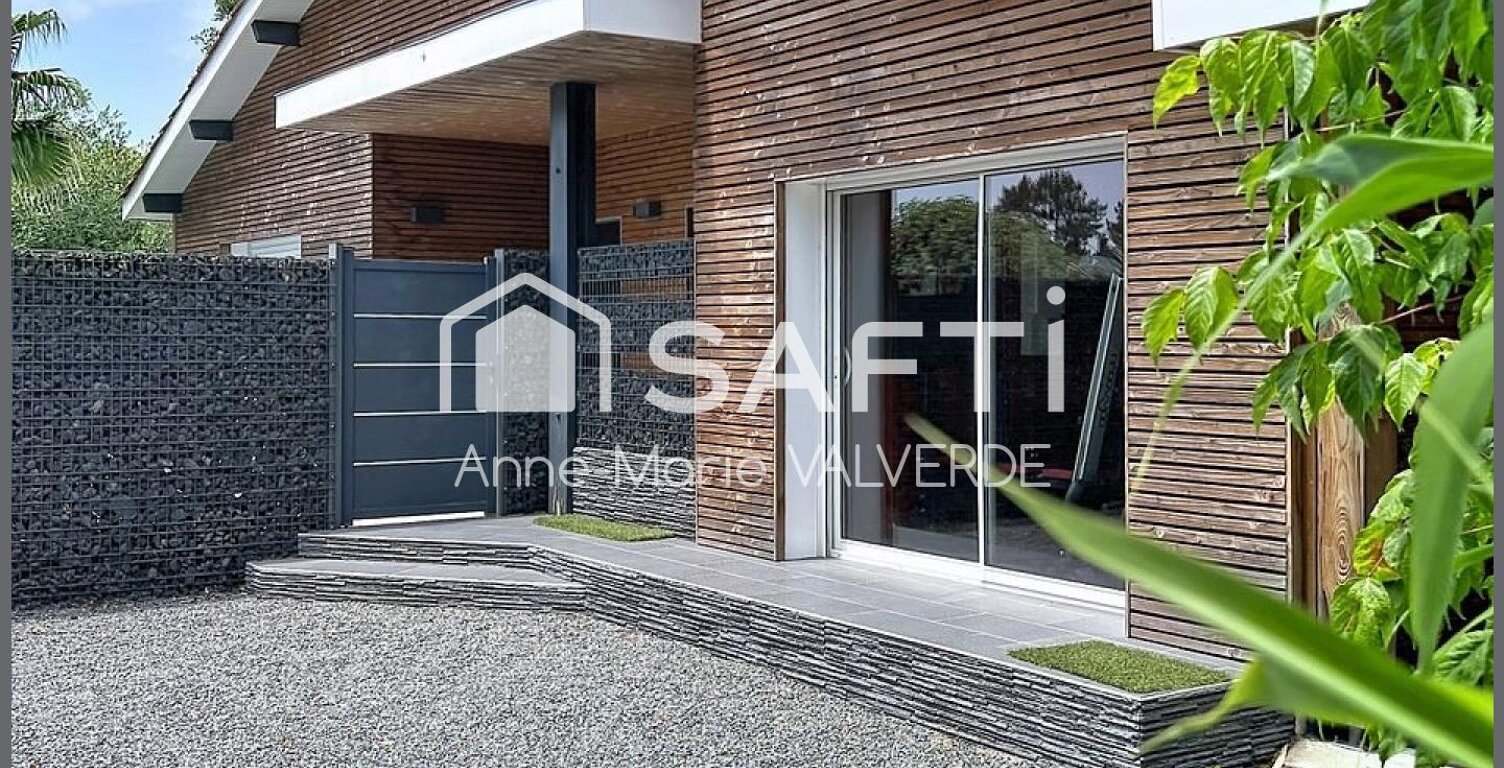 LACANAU VILLE 170 m²  PISCINE CHAUFFÉE  GARAGE  TERRAIN DE 941 m² — photo 1