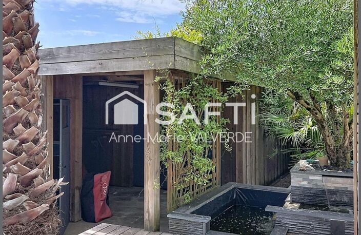 LACANAU VILLE 170 m²  PISCINE CHAUFFÉE  GARAGE  TERRAIN DE 941 m² — photo 4